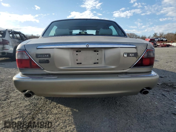 1998 Jaguar XJ with VIN SAJHX1248WC853422, listed as a Copart auction lot 80614724 with 76,269 mi miles and Non repairable. Bid and sale history available at DreamBid. Image 6.