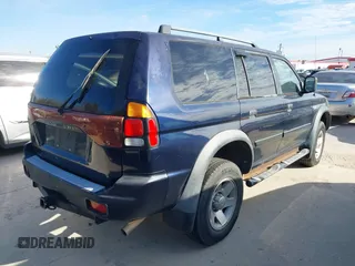 2002 Mitsubishi Montero Sport ES with VIN JA4LS21H02J040318, listed as a IAAI auction lot 41272566 with 278,339 mi miles. Bid and sale history available at carsss.com. Image 4.