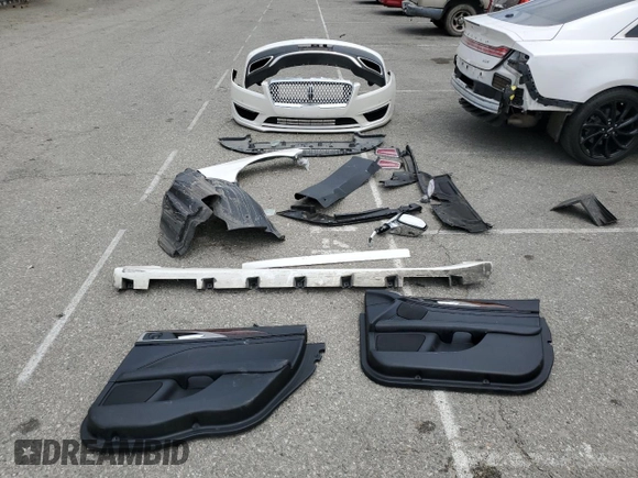2020 Lincoln MKZ Reserve z VIN 3LN6L5E99LR609268, wystawiony jako Copart lot #56062065 z przebiegiem 63 466 mil mil oraz Szkoda całkowita • Salvage title. Historia ofert i sprzedaży dostępna na DreamBid. Obrazek 12.