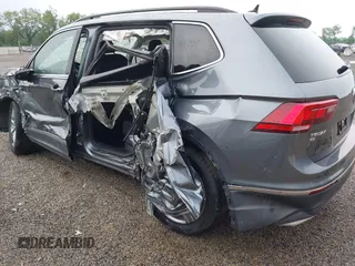 2021 Volkswagen Tiguan SE z VIN 3VV2B7AXXMM070228, wystawiony jako IAAI lot #42295644 z przebiegiem 89 576 mil mil oraz . Historia ofert i sprzedaży dostępna na DreamBid. Obrazek 14.