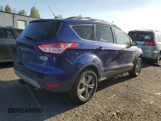 2014 Ford Escape SE z VIN 1FMCU9G95EUB88150, wystawiony jako Copart lot #52570095 z przebiegiem 143 129 mil mil oraz Szkoda całkowita • Salvage title. Historia ofert i sprzedaży dostępna na DreamBid. Obrazek 3.