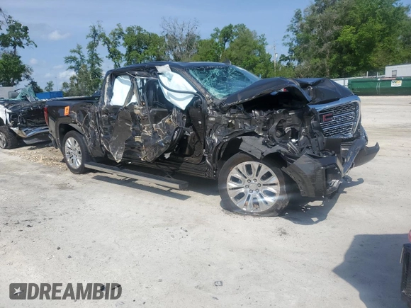 2020 GMC Sierra 1500 Denali with VIN 1GTU9FEL3LZ164890, listed as a Copart auction lot 51253935 with 63,147 mi miles and Non Repairable. Bid and sale history available at DreamBid. Image 4.