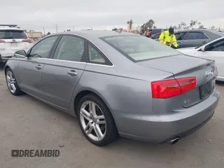 2015 Audi A6 Premium Plus z VIN WAUGFAFC6FN009203, wystawiony jako IAAI lot #42242726 z przebiegiem 69 163 mil mil oraz . Historia ofert i sprzedaży dostępna na DreamBid. Obrazek 3.