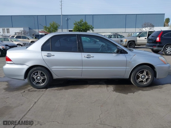 2004 Mitsubishi Lancer ES with VIN JA3AJ26E54U052124, listed as a IAAI auction lot 41804473 with 165,786 mi miles. Bid and sale history available at carsss.com. Image 14.