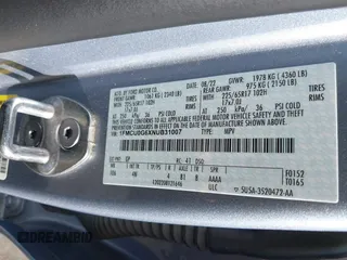 2022 Ford Escape SE z VIN 1FMCU0G6XNUB31007, wystawiony jako IAAI lot #42510666 z przebiegiem 106 236 mil mil oraz . Historia ofert i sprzedaży dostępna na DreamBid. Obrazek 9.
