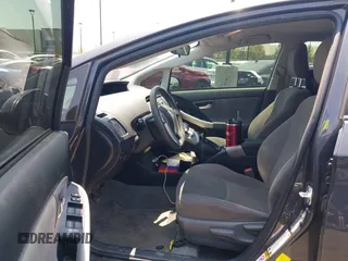 2015 Toyota Prius Four with VIN JTDKN3DUXF0401038, listed as a IAAI auction lot 42461797 with 142,302 mi miles and . Bid and sale history available at DreamBid. Image 5.