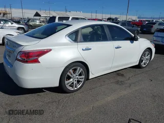 2013 Nissan Altima SV with VIN 1N4BL3AP7DN431432, listed as a IAAI auction lot 41389189 with 227,047 mi miles and . Bid and sale history available at DreamBid. Image 4.