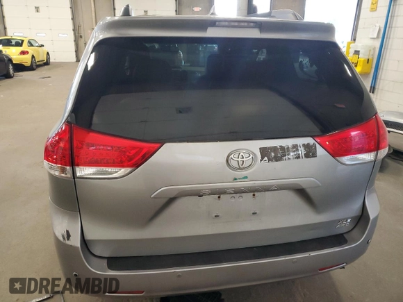 2012 Toyota Sienna XLE with VIN 5TDDK3DC2CS031088, listed as a Copart auction lot 60642845 with 186,586 mi miles and Salvage title. Bid and sale history available at DreamBid. Image 6.