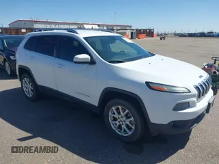 2014 Jeep Cherokee Latitude z VIN 1C4PJMCS4EW233979, wystawiony jako IAAI lot #41976651 z przebiegiem 138 815 mil mil oraz . Historia ofert i sprzedaży dostępna na DreamBid. Obrazek 1.