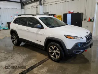 2017 Jeep Cherokee Trailhawk L Plus with VIN 1C4PJMBS7HD225005, listed as a Copart auction lot 57022795 with 171,655 mi miles and Clean title. Bid and sale history available at DreamBid. Image 4.