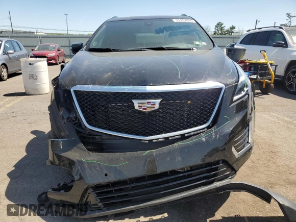 2023 Cadillac XT5 AWD Sport with VIN 1GYKNGRS8PZ100581, listed as a Copart auction lot 55157035 with 14,637 mi miles and Salvage title. Bid and sale history available at DreamBid. Image 5.