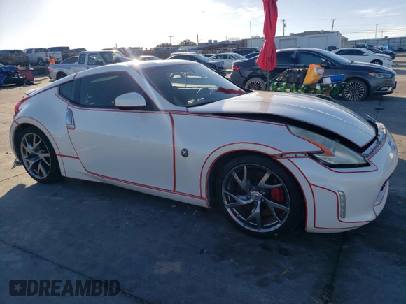 2014 Nissan 370Z Touring with VIN JN1AZ4EH8EM631484, listed as a Copart auction lot 86884574 with 0 mi miles and Salvage Title. Bid and sale history available at carsss.com. Image 4.