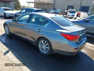 2014 Infiniti Q50 with VIN JN1BV7AP0EM682444, listed as a IAAI auction lot 41857312 with 140,765 mi miles. Bid and sale history available at carsss.com. Image 3.