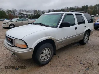 2001 GMC Jimmy SLT with VIN 1GKDT13W712155718, listed as a Copart auction lot 80688554 with 114,116 mi miles and Salvage Title. Bid and sale history available at carsss.com. Image 1.
