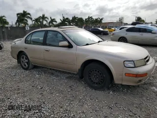 1997 Nissan Maxima GXE с VIN JN1CA21D2VM528522, выставлен на аукционе Copart как лот 73315194 с пробегом 206 683 миль миль и Списание • Salvage title. История ставок и продаж доступна на DreamBid. Изображение 4.