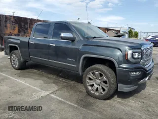 2017 GMC Sierra 1500 Denali with VIN 3GTU2PEJ6HG172367, listed as a Copart auction lot 53167045 with 134,015 mi miles and Salvage Title. Bid and sale history available at DreamBid. Image 4.