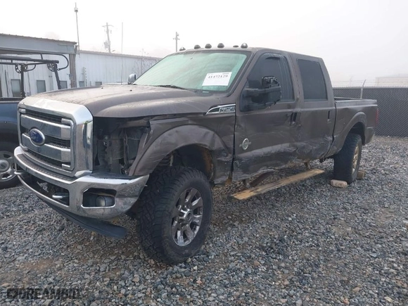2015 Ford Super Duty F-250 SRW Lariat with VIN 1FT7W2BT5FEB19206, listed as a IAAI auction lot 41472129 with 185,542 mi miles. Bid and sale history available at carsss.com. Image 2.