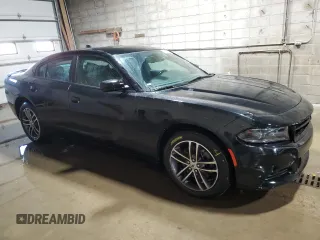 2019 Dodge Charger SXT with VIN 2C3CDXJG1KH757949, listed as a Copart auction lot 82231714 with 75,985 mi miles and Salvage Title. Bid and sale history available at DreamBid. Image 4.