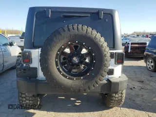2018 Jeep Wrangler Unlimited Sport S with VIN 1C4BJWDG5JL846821, listed as a Copart auction lot 53310315 with 84,880 mi miles and Salvage title. Bid and sale history available at DreamBid. Image 6.