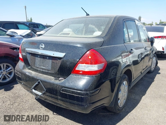 2009 Nissan Versa S with VIN 3N1BC11E19L440957, listed as a IAAI auction lot 40039437 with Not Provided miles and . Bid and sale history available at DreamBid. Image 4.