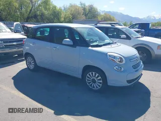 2014 FIAT 500L Easy with VIN ZFBCFABH9EZ010519, listed as a IAAI auction lot 42150633 with 60,724 mi miles. Bid and sale history available at carsss.com. Image 1.