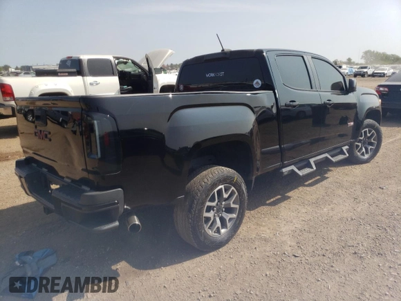 2015 GMC Canyon 4WD SLE with VIN 1GTG6BE31F1121425, listed as a Copart auction lot 67322994 with 112,435 mi miles and Salvage Title. Bid and sale history available at carsss.com. Image 3.