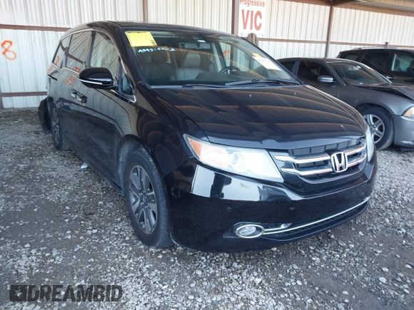 2014 Honda Odyssey Touring with VIN 5FNRL5H94EB110590, listed as a IAAI auction lot 42092929 with 242,338 mi miles and . Bid and sale history available at DreamBid. Image 1.