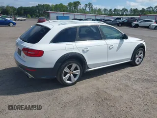 2015 Audi allroad Premium Plus with VIN WA1UFAFLXFA055527, listed as a IAAI auction lot 41760426 with 130,238 mi miles. Bid and sale history available at carsss.com. Image 4.