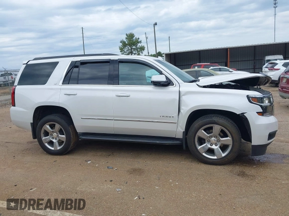 2020 Chevrolet Tahoe LT with VIN 1GNSCBKC4LR181887, listed as a IAAI auction lot 42160821 with 106,757 mi miles and . Bid and sale history available at DreamBid. Image 13.