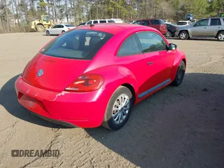 2012 Volkswagen Beetle Entry PZEV with VIN 3VWFP7AT8CM646053, listed as a IAAI auction lot 41700898 with 135,525 mi miles. Bid and sale history available at carsss.com. Image 4.