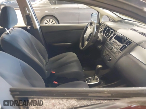 2009 Nissan Versa 1.8 S with VIN 3N1BC13E39L415491, listed as a IAAI auction lot 41614914 with 104,795 mi miles. Bid and sale history available at carsss.com. Image 5.
