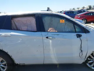 2017 Buick Envision Essence with VIN LRBFXBSA2HD237325, listed as a IAAI auction lot 39874196 with 95,819 mi miles and . Bid and sale history available at carsss.com. Image 12.