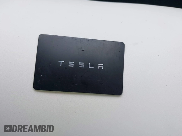 2023 Tesla Model 3 with VIN 5YJ3E1EA2PF588467, listed as a IAAI auction lot 42254921 with 11,217 mi miles and . Bid and sale history available at DreamBid. Image 11.