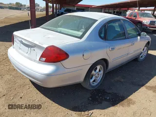 2002 Ford Taurus SE Standard with VIN 1FAFP53UX2G120938, listed as a IAAI auction lot 41667141 with 205,465 mi miles and . Bid and sale history available at DreamBid. Image 4.