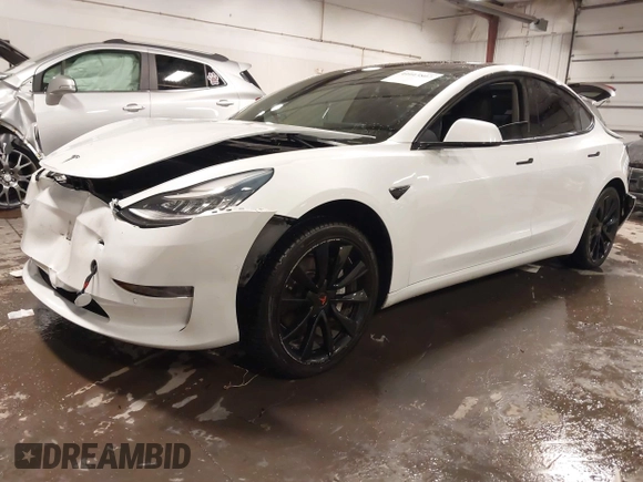 2018 Tesla Model 3 Long Range Battery with VIN 5YJ3E1EA8JF154738, listed as a IAAI auction lot 41013807 with 115,488 mi miles and . Bid and sale history available at DreamBid. Image 22.