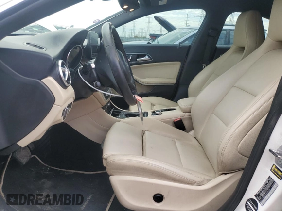 2018 Mercedes-Benz CLA 250 with VIN WDDSJ4EBXJN658054, listed as a Copart auction lot 54446815 with 94,834 mi miles and Salvage title. Bid and sale history available at DreamBid. Image 7.