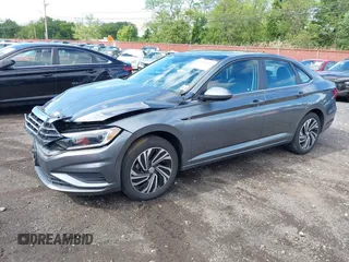 2020 Volkswagen Jetta SEL z VIN 3VWEB7BU2LM024016, wystawiony jako IAAI lot #42341318 z przebiegiem 40 480 mil mil oraz . Historia ofert i sprzedaży dostępna na DreamBid. Obrazek 18.