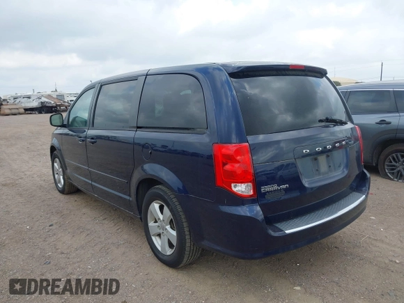 2013 Dodge Grand Caravan SE with VIN 2C4RDGBG4DR567547, listed as a IAAI auction lot 42091862 with 165,827 mi miles and . Bid and sale history available at DreamBid. Image 3.