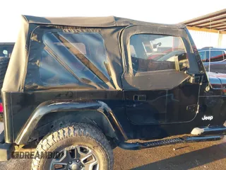 1997 Jeep Wrangler SE with VIN 1J4FY29P0VP415195, listed as a IAAI auction lot 41221078 with 137,046 mi miles. Bid and sale history available at carsss.com. Image 15.
