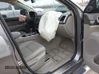 2013 Jeep Grand Cherokee Laredo with VIN 1C4RJEAG2DC571569, listed as a IAAI auction lot 41100518 with 98,265 mi miles. Bid and sale history available at carsss.com. Image 5.