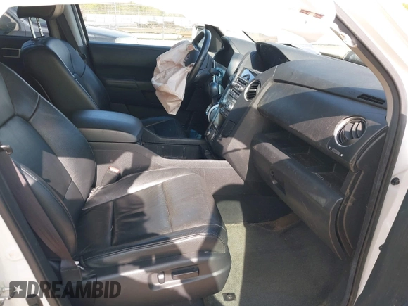 2013 Honda Pilot Touring with VIN 5FNYF3H92DB034731, listed as a IAAI auction lot 42049853 with 127,278 mi miles and . Bid and sale history available at DreamBid. Image 5.