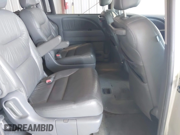 2005 Honda Odyssey EX-L with VIN 5FNRL38705B106488, listed as a IAAI auction lot 42545141 with 199,619 mi miles and . Bid and sale history available at DreamBid. Image 8.