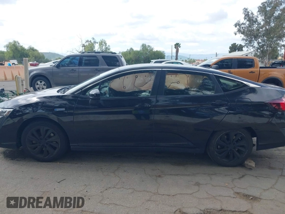2018 Honda Clarity Plug-In Hybrid with VIN JHMZC5F10JC014054, listed as a IAAI auction lot 41932195 with 100,643 mi miles. Bid and sale history available at carsss.com. Image 14.