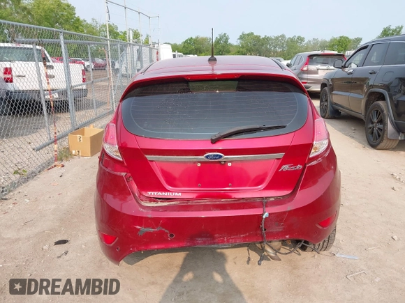 2015 Ford Fiesta Titanium z VIN 3FADP4FJ1FM171680, wystawiony jako IAAI lot #42383105 z przebiegiem 51 396 mil mil oraz . Historia ofert i sprzedaży dostępna na DreamBid. Obrazek 16.