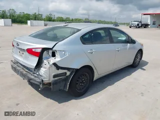 2014 Kia Forte LX with VIN KNAFK4A69E5248253, listed as a IAAI auction lot 42049489 with 154,541 mi miles. Bid and sale history available at carsss.com. Image 4.