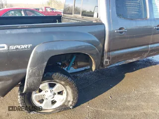 2014 Toyota Tacoma PreRunner with VIN 5TFJU4GN0EX057850, listed as a IAAI auction lot 41656053 with 170,269 mi miles. Bid and sale history available at carsss.com. Image 6.