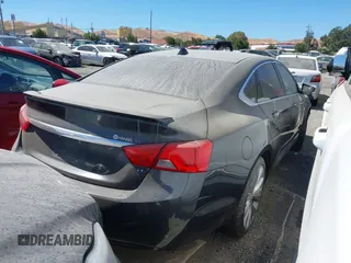 2014 Chevrolet Impala LT with VIN 1G1125S30EU118979, listed as a IAAI auction lot 40084364 with 145,015 mi miles and . Bid and sale history available at DreamBid. Image 4.