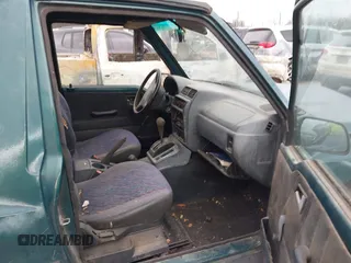 1997 Chevrolet Tracker z VIN 2CNBJ1864V6904934, wystawiony jako IAAI lot #41512446 z przebiegiem 223 032 mil mil oraz . Historia ofert i sprzedaży dostępna na DreamBid. Obrazek 5.