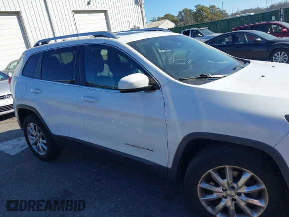 2015 Jeep Cherokee Limited with VIN 1C4PJMDS7FW688762, listed as a IAAI auction lot 41709877 with 154,499 mi miles. Bid and sale history available at carsss.com. Image 13.