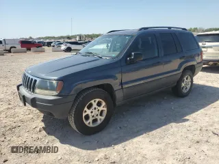 2003 Jeep Grand Cherokee Laredo with VIN 1J4GX48S83C504543, listed as a Copart auction lot 52723835 with 220,574 mi miles and Clean Title. Bid and sale history available at carsss.com. Image 1.
